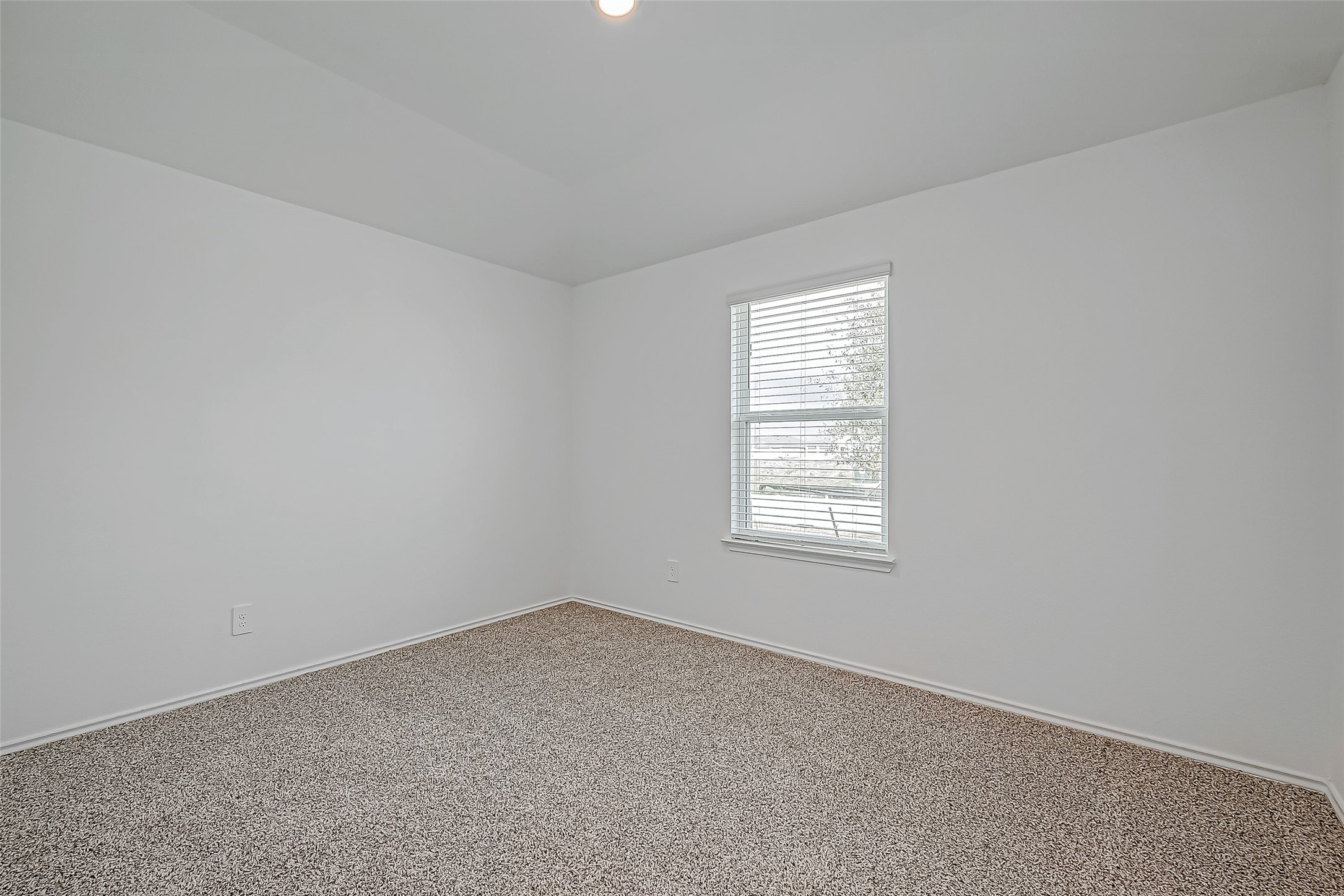532 Comal Trail Dayton, TX 77535 - Photo 13 of 26 an empty room with a window