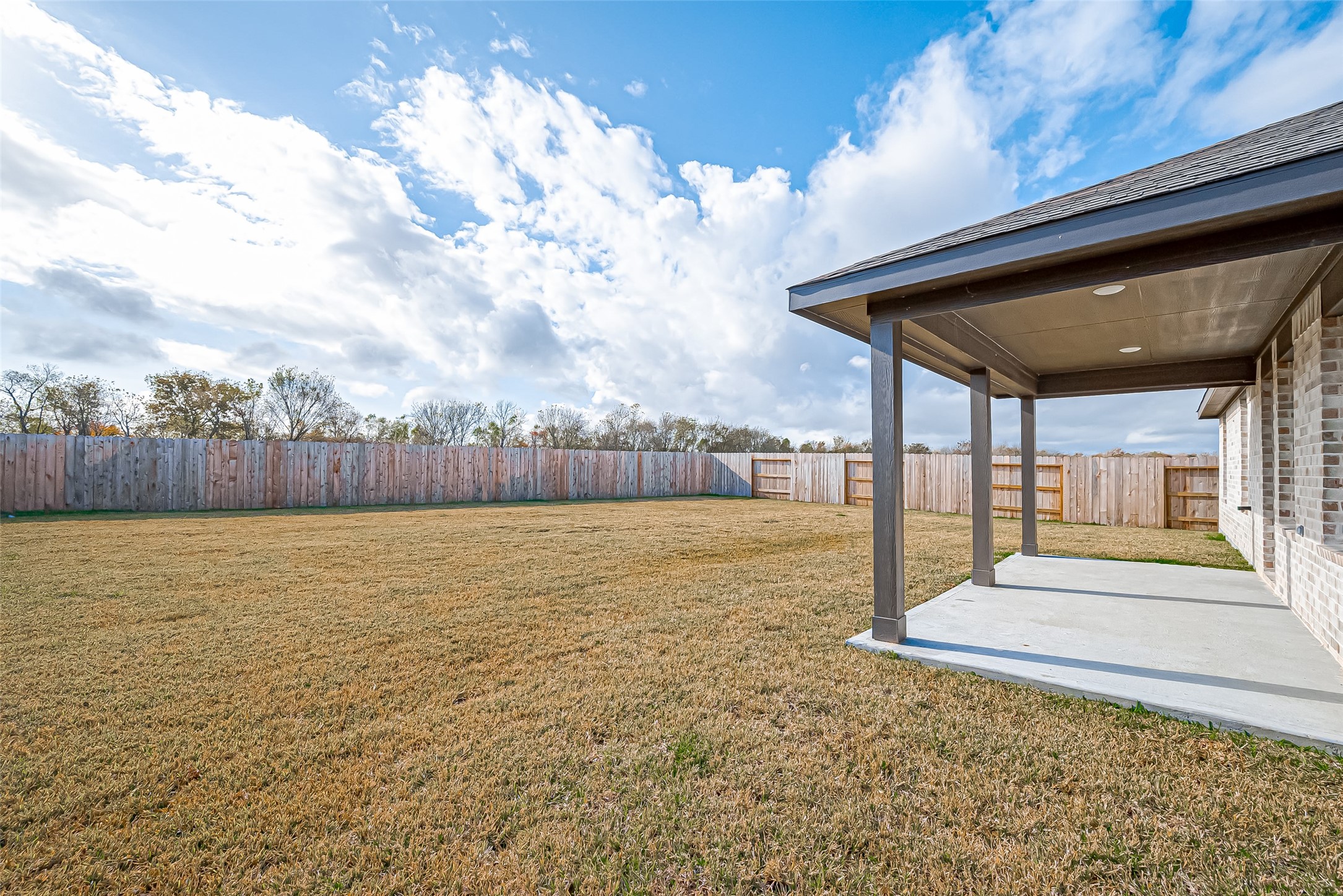 532 Comal Trail Dayton, TX 77535 - Photo 22 of 26 a view of a backyard