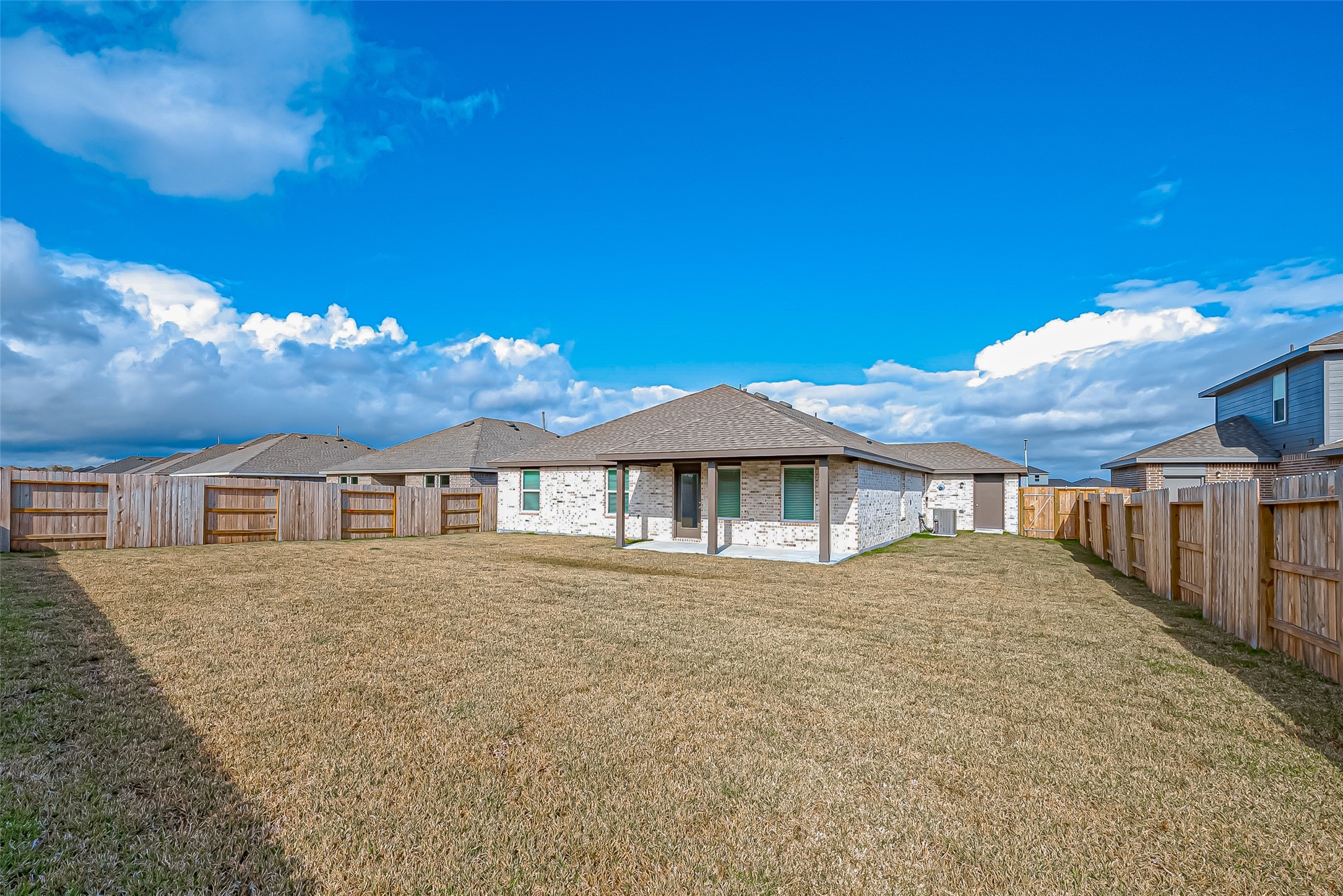 532 Comal Trail Dayton, TX 77535 - Photo 23 of 26 a house with yard in front of it
