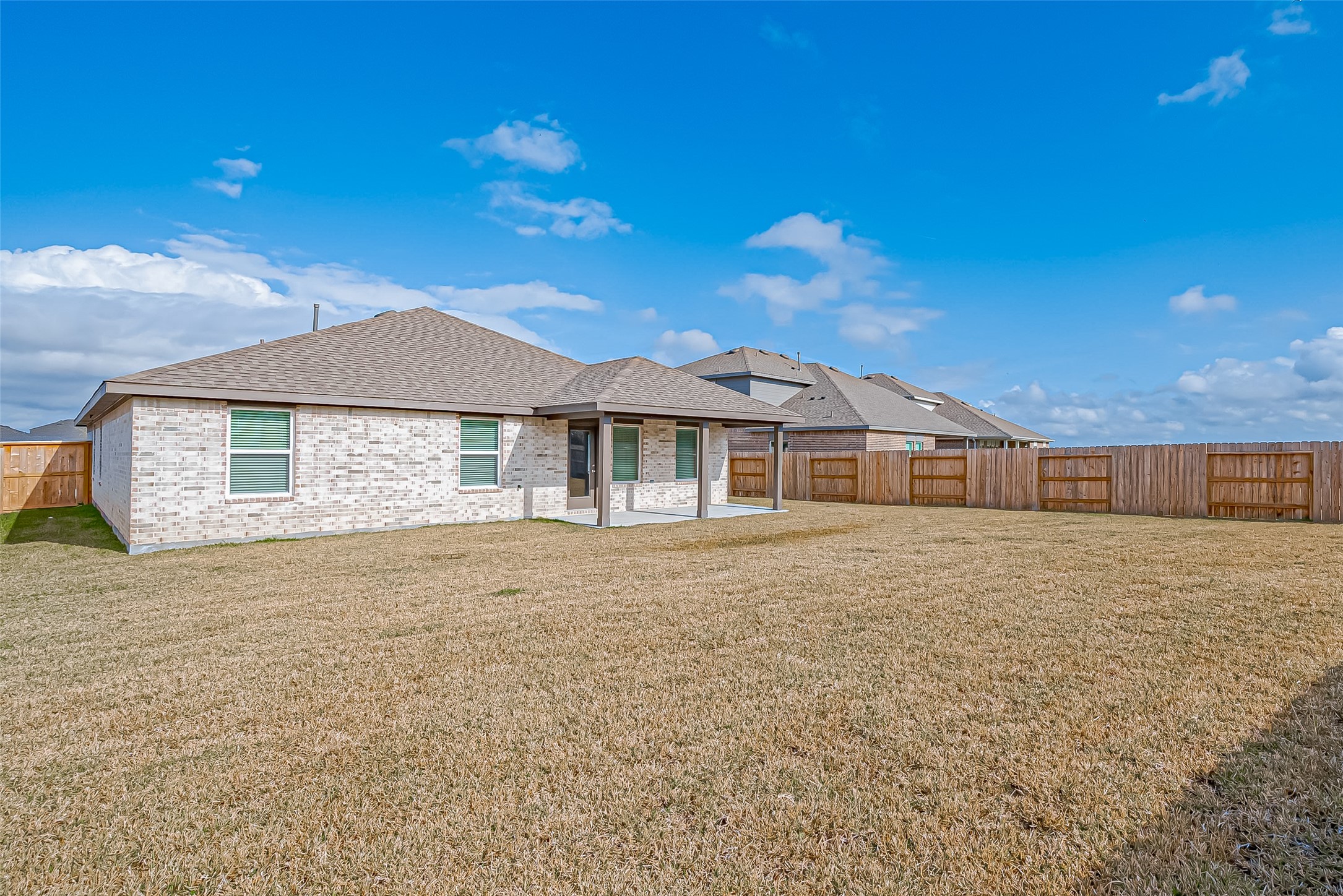 532 Comal Trail Dayton, TX 77535 - Photo 24 of 26 a front view of a house with a garden