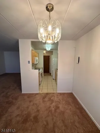 a view of a livingroom with a chandelier