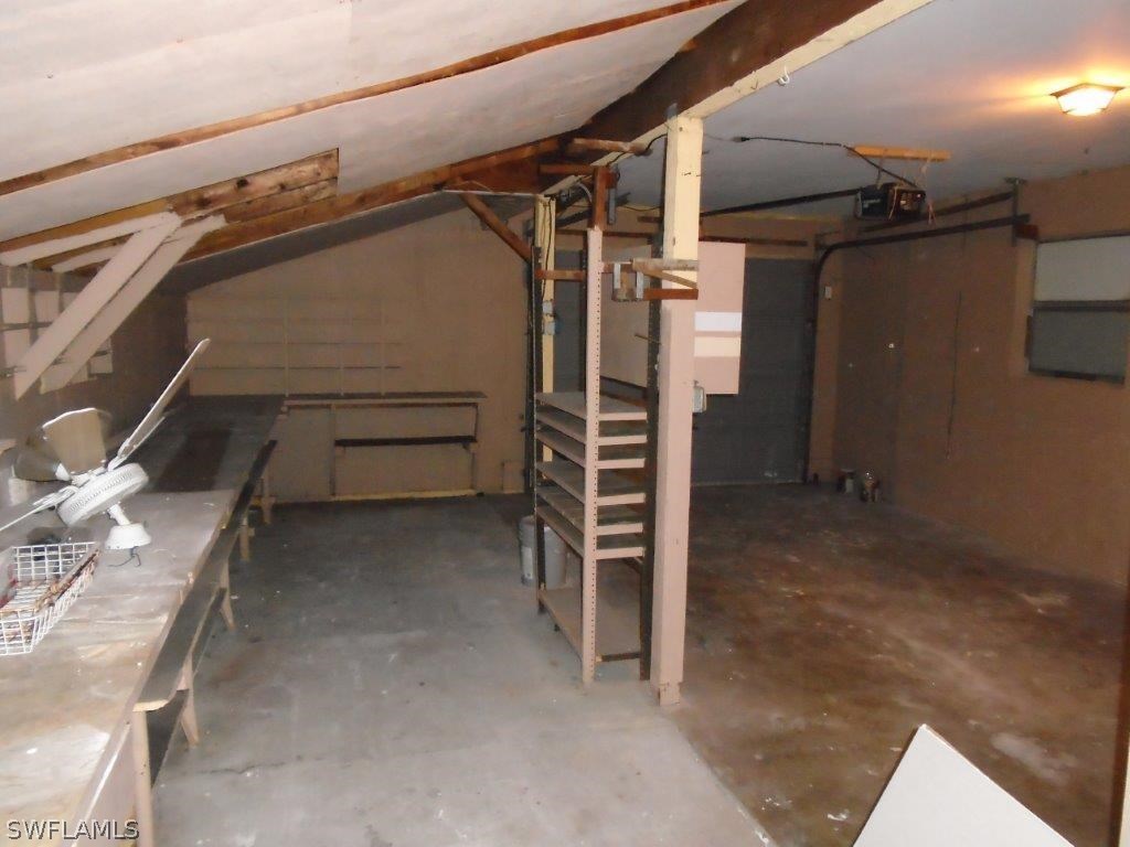 113 Rowland Road Lehigh Acres, FL 33936 - Photo 14 of 14 a view of walk in closet with clothes and shoes
