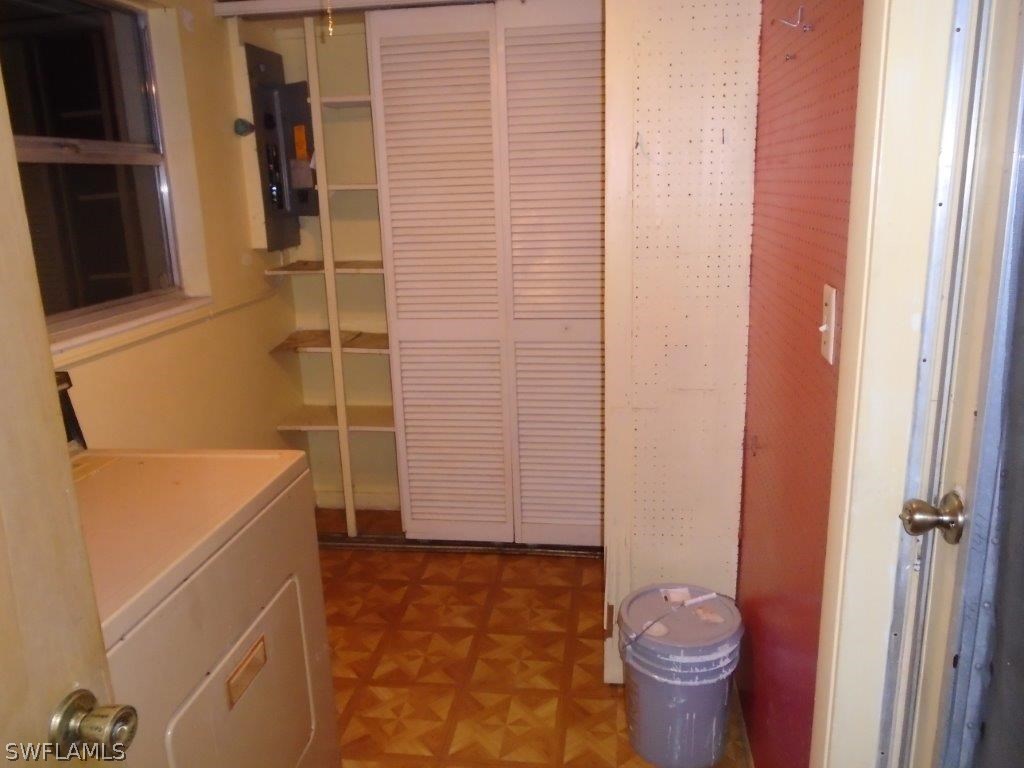 113 Rowland Road Lehigh Acres, FL 33936 - Photo 7 of 14 a bathroom with a sink and toilet