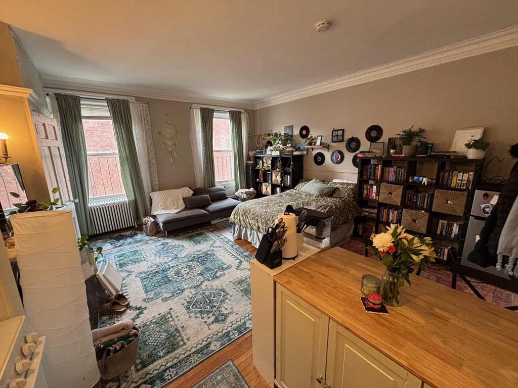 98 Charles Street, Unit 9 Boston, MA 02114 - Photo 2 of 7 a view of a room with gym equipment