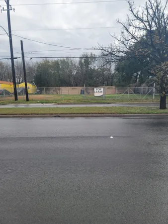 a view of road with houses