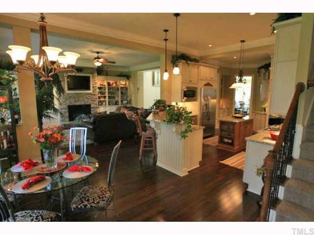 9004 Albatross Court Raleigh, NC 27613 - Photo 12 of 12 a dining room filled with lots of wooden furniture