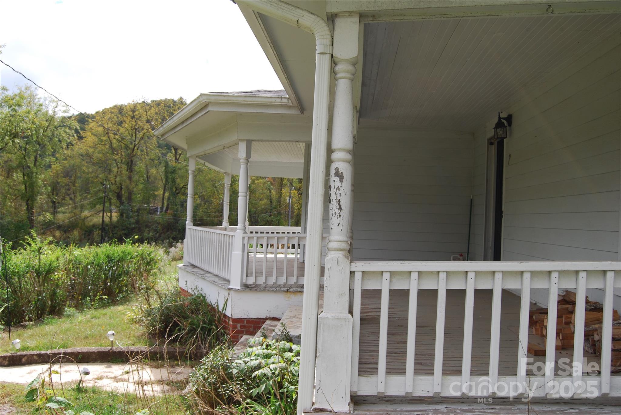 7 Noble Road Fairview, NC 28730 - Photo 15 of 44 a view of a porch