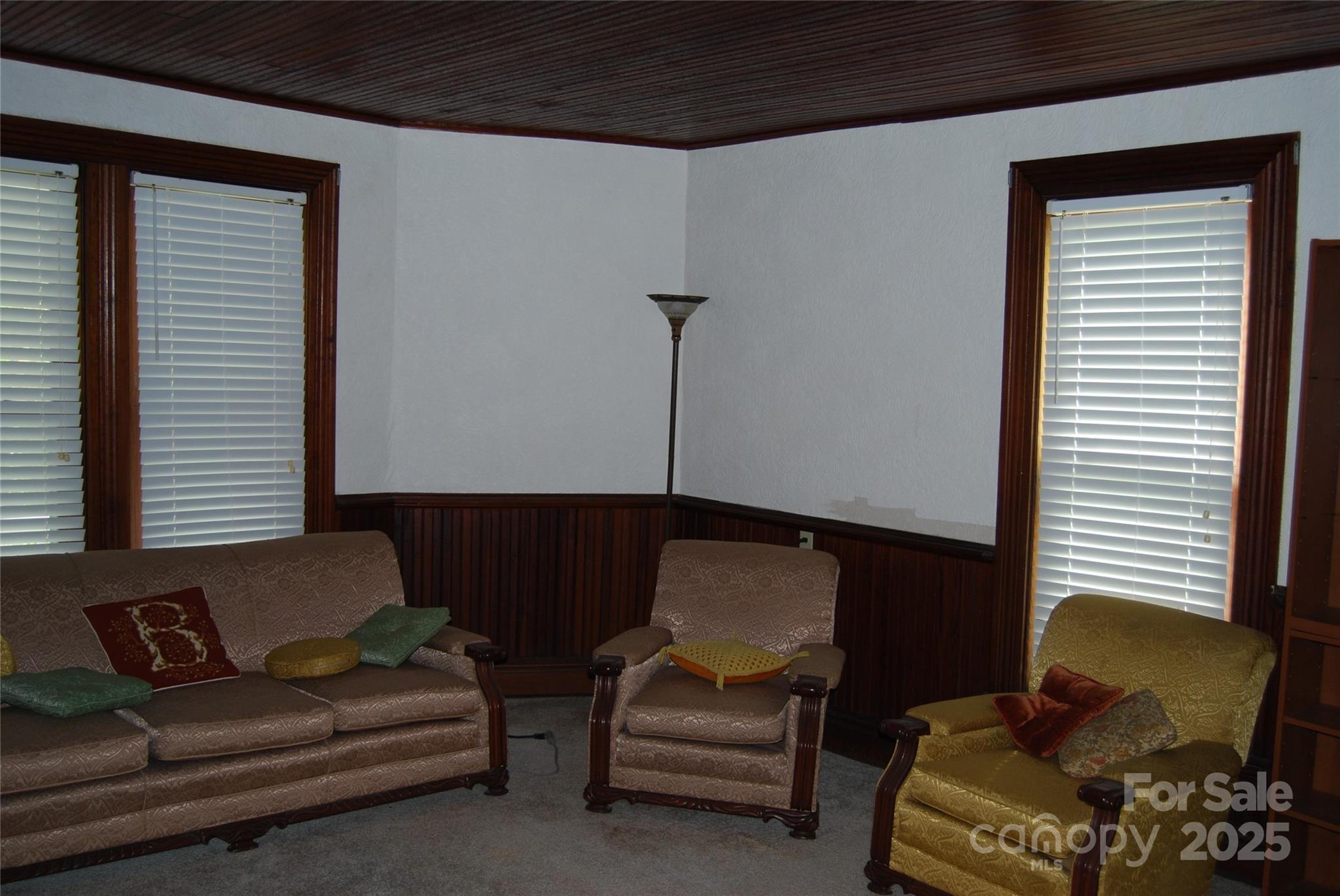 7 Noble Road Fairview, NC 28730 - Photo 17 of 44 a living room with furniture and a window