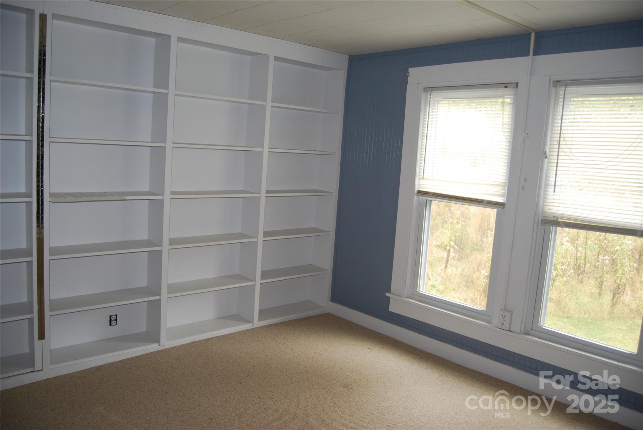 7 Noble Road Fairview, NC 28730 - Photo 29 of 44 a view of an empty room with a window