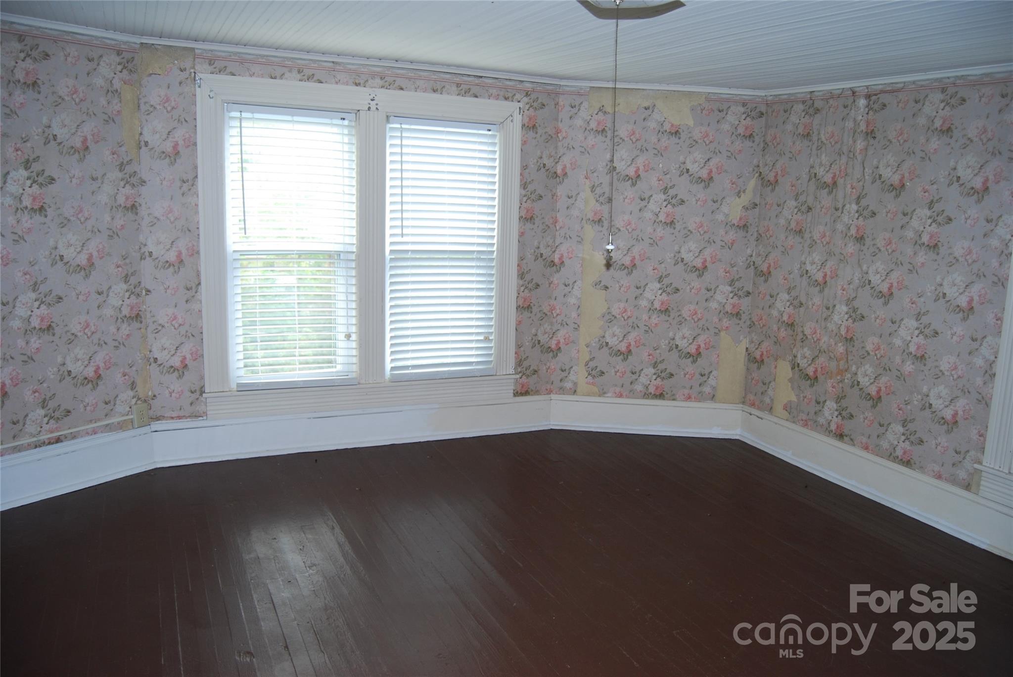 7 Noble Road Fairview, NC 28730 - Photo 30 of 44 wooden floor in an empty room with a window
