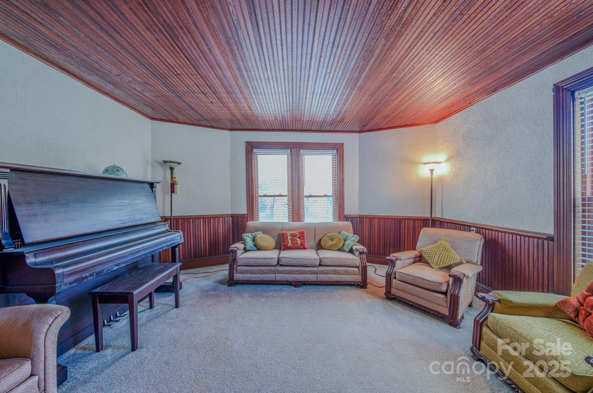 7 Noble Road Fairview, NC 28730 - Photo 42 of 44 a living room with furniture and a window