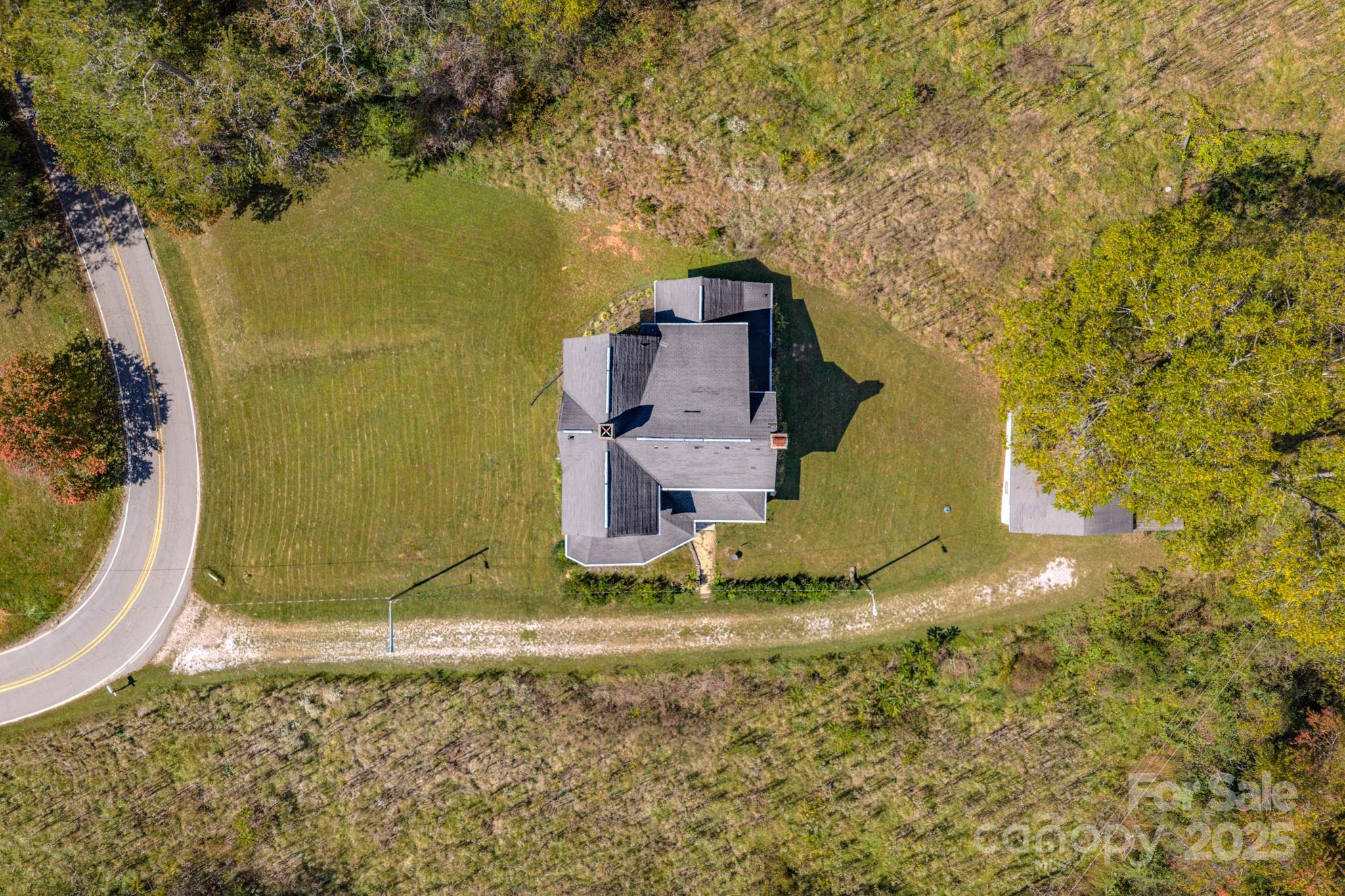 7 Noble Road Fairview, NC 28730 - Photo 10 of 44 an aerial view of a house with a yard