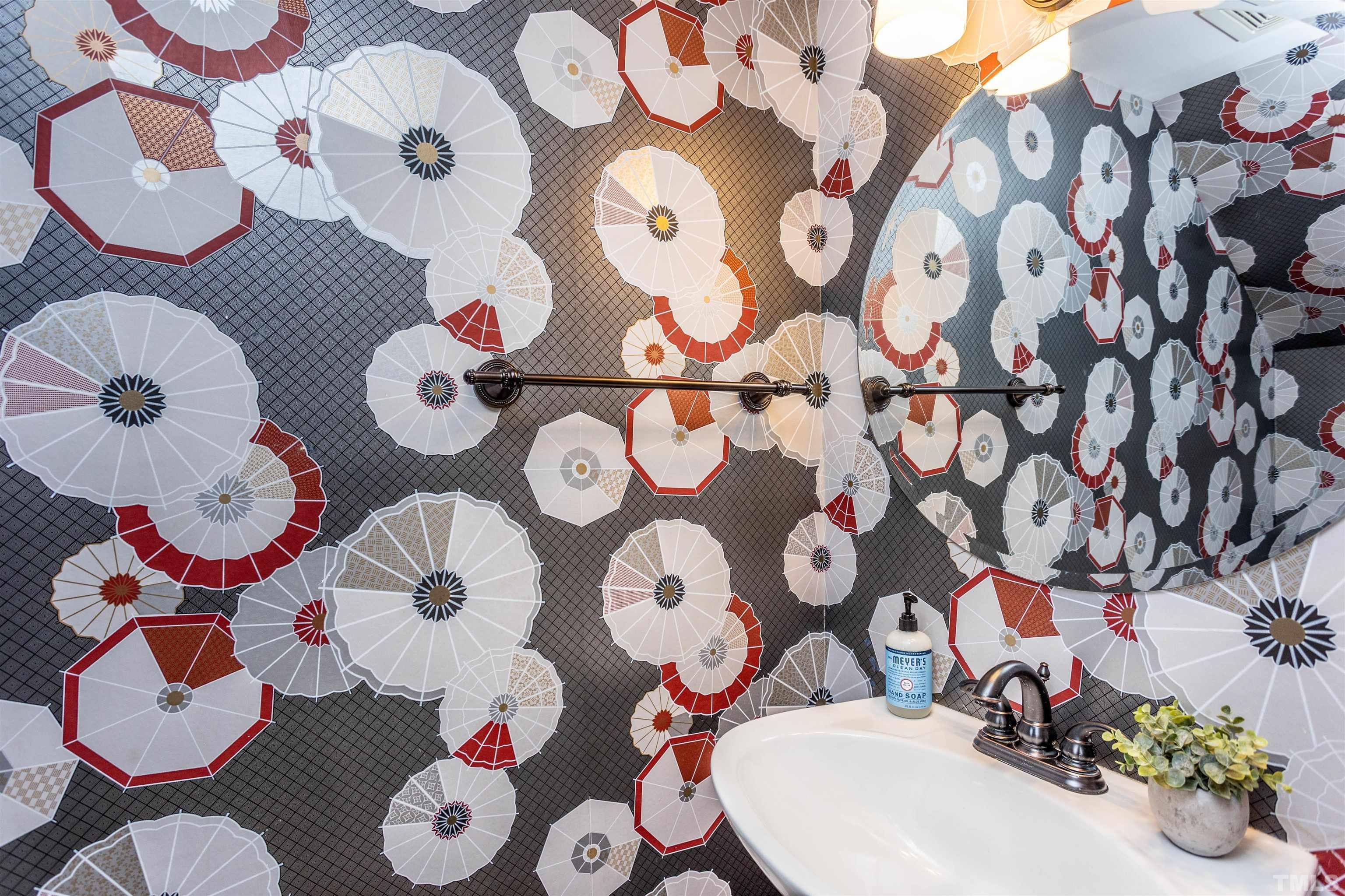 1024 Brighthurst Drive Raleigh, NC 27605 - Photo 14 of 26 kids bathroom with a sink and mirror with toilet