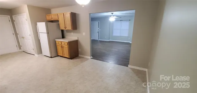 a view of a storage & utility room with a sink
