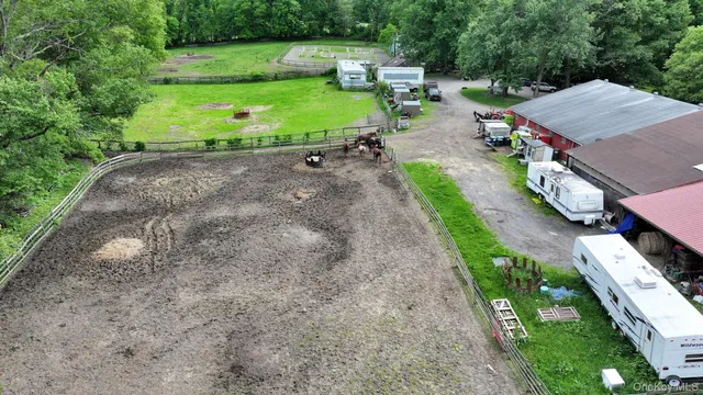 a view of a park with large trees