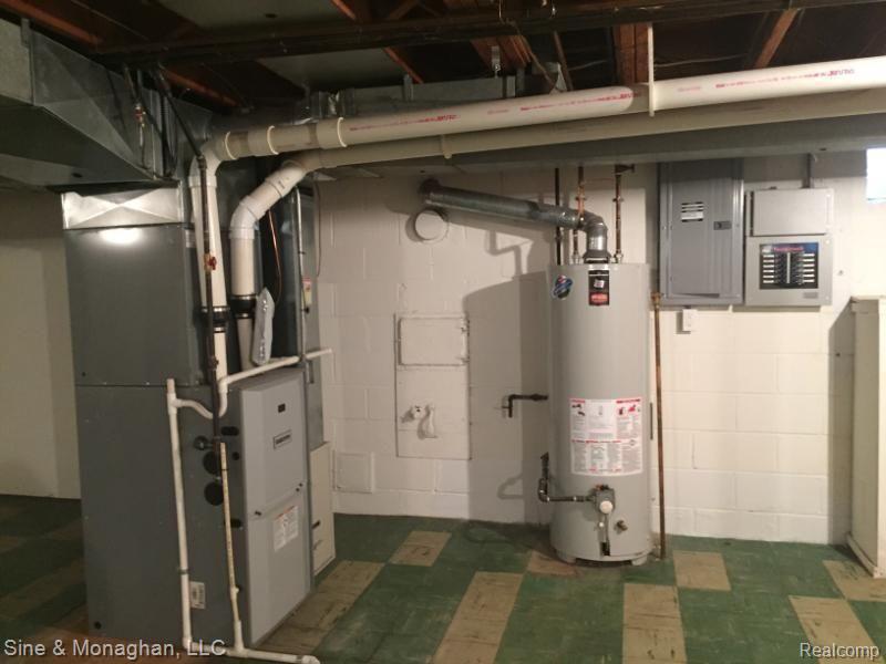 613 Hawthorne Road Grosse Pointe, MI 48236 - Photo 22 of 31 613 FURNACE ELECTRICAL PANEL AND GENERATOR CONTROLS.JPG