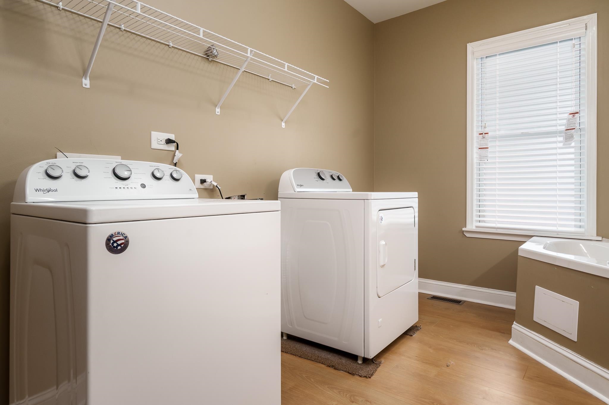 720 South 2nd Street DeKalb, IL 60115 - Photo 17 of 20 a utility room with dryer and washer