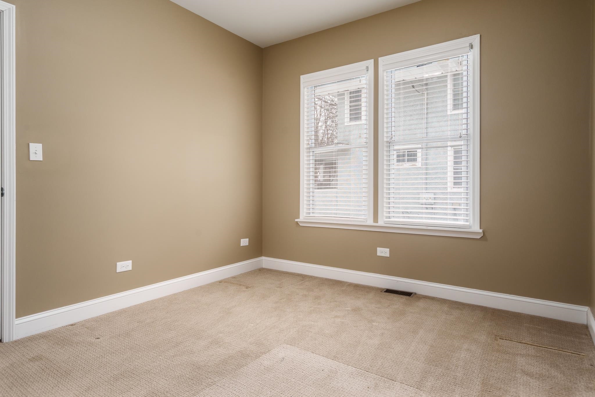 720 South 2nd Street DeKalb, IL 60115 - Photo 19 of 20 a view of a room with a window