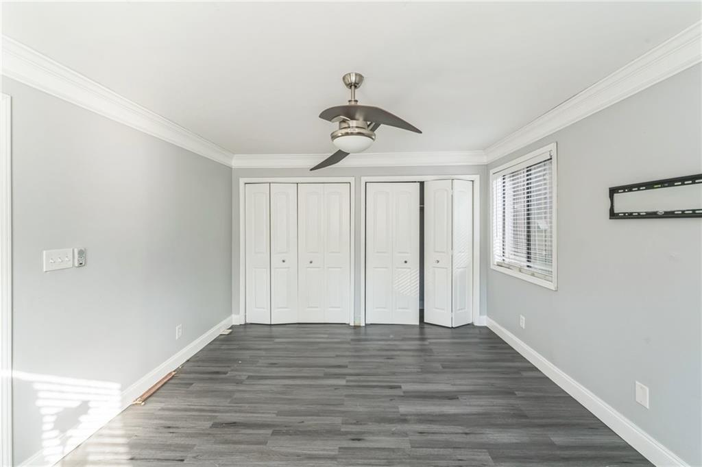 18 Quail Run, Unit A Decatur, GA 30035 - Photo 17 of 28 a view of empty room with wooden floor