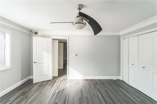 a bathroom with a bathtub and a window
