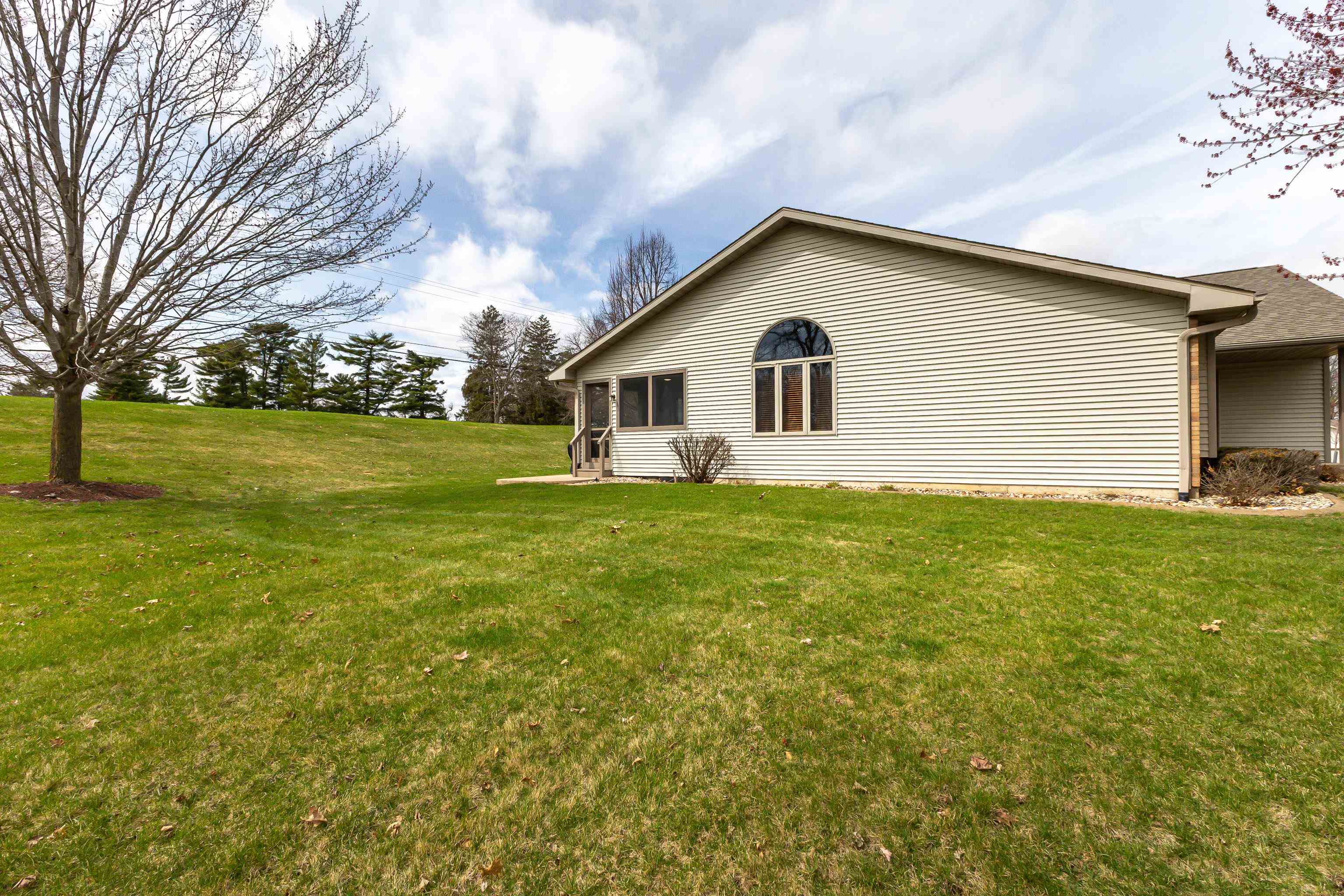 825 Shadow Bluff Drive Galena, IL 61036 - Photo 34 of 37 a view of a house with a yard