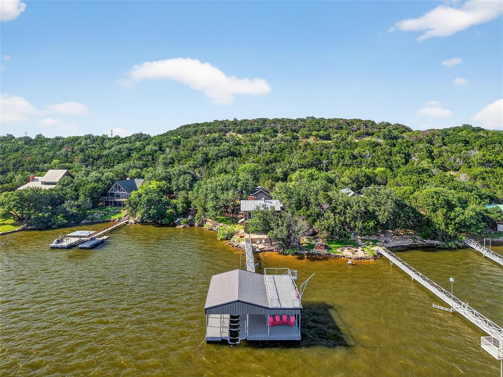 a view of a swimming pool with a yard