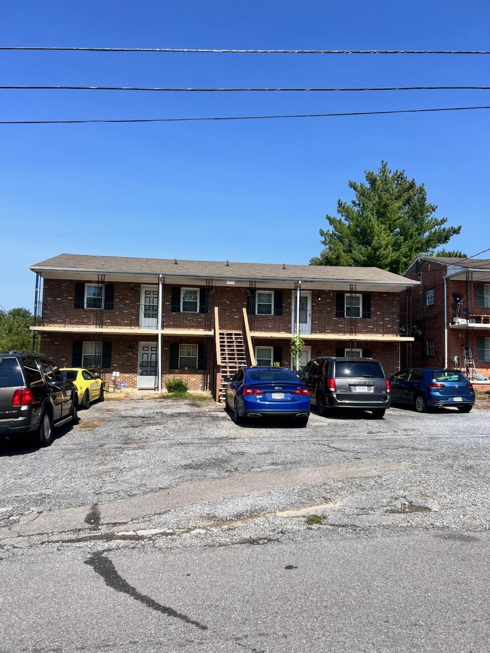 a view of a car parked in front of a house