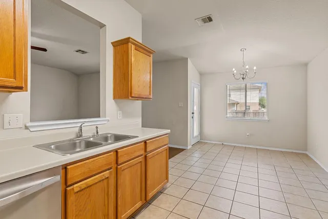a bathroom with a sink a vanity and a mirror