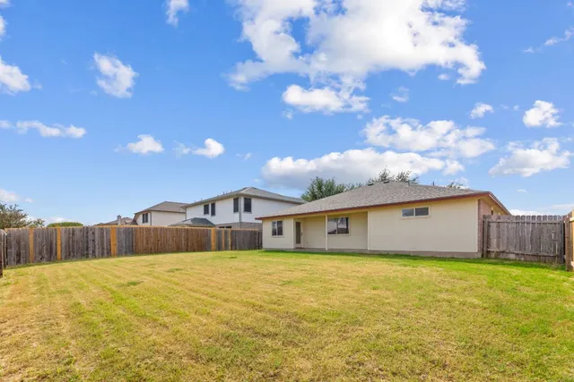 a view of a house with a swimming pool