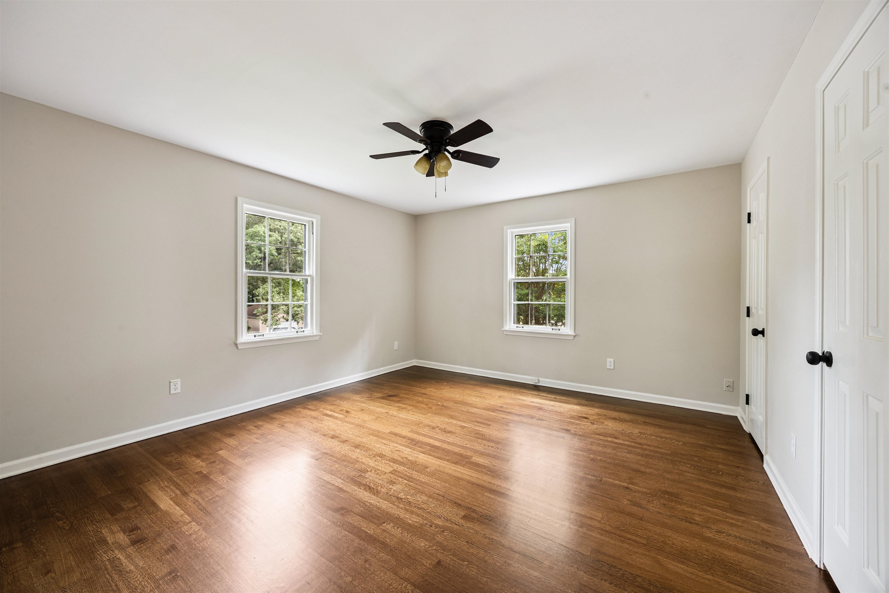 2030 Brierbrook Road Germantown, TN 38138 - Photo 12 of 16 Spare room featuring dark wood-type flooring, plenty of natural light, and a ceiling fan