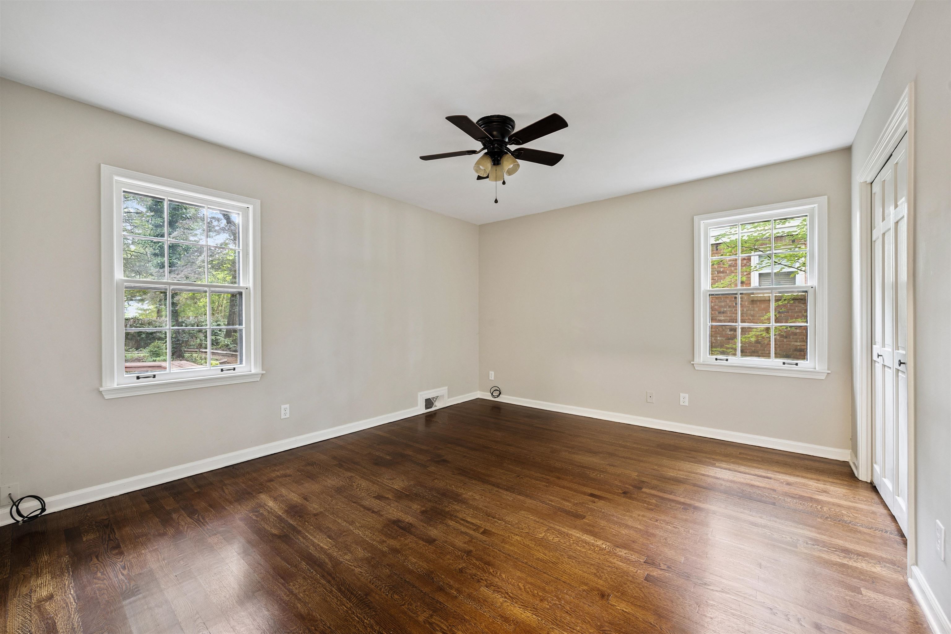 2030 Brierbrook Road Germantown, TN 38138 - Photo 5 of 16 Spare room featuring dark wood finished floors and a ceiling fan