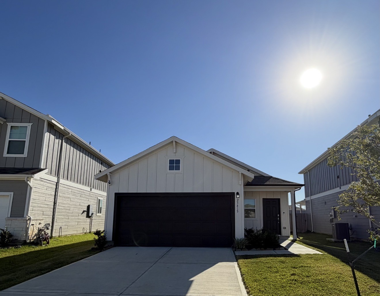 23415 Wagon Cart Road Hockley, TX 77447 - Photo 2 of 26 a front view of a house with a yard