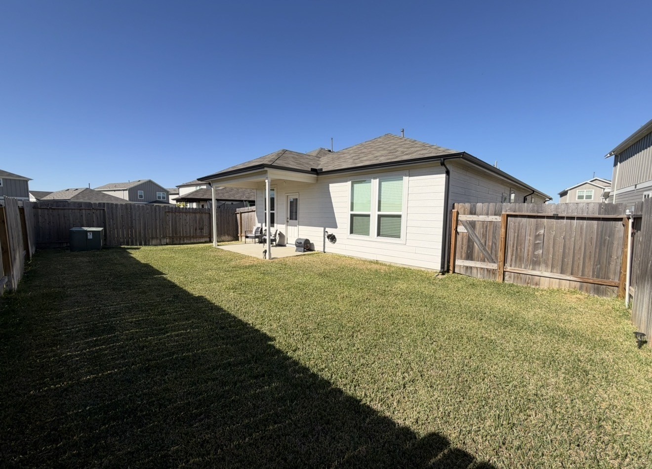 23415 Wagon Cart Road Hockley, TX 77447 - Photo 24 of 26 a view of a house with a yard