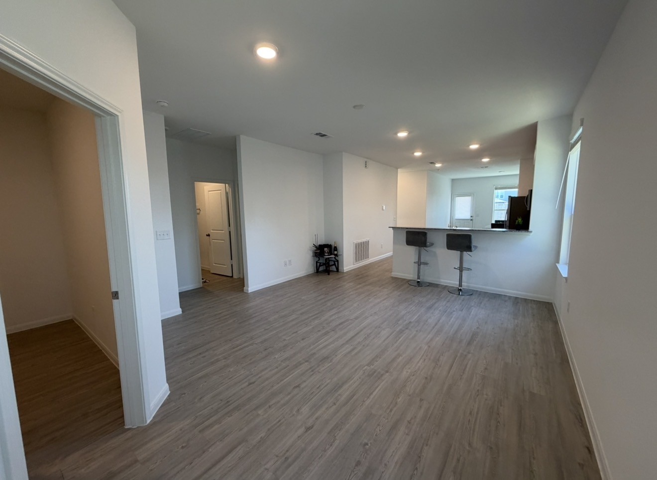 23415 Wagon Cart Road Hockley, TX 77447 - Photo 5 of 26 a view of empty room with wooden floor