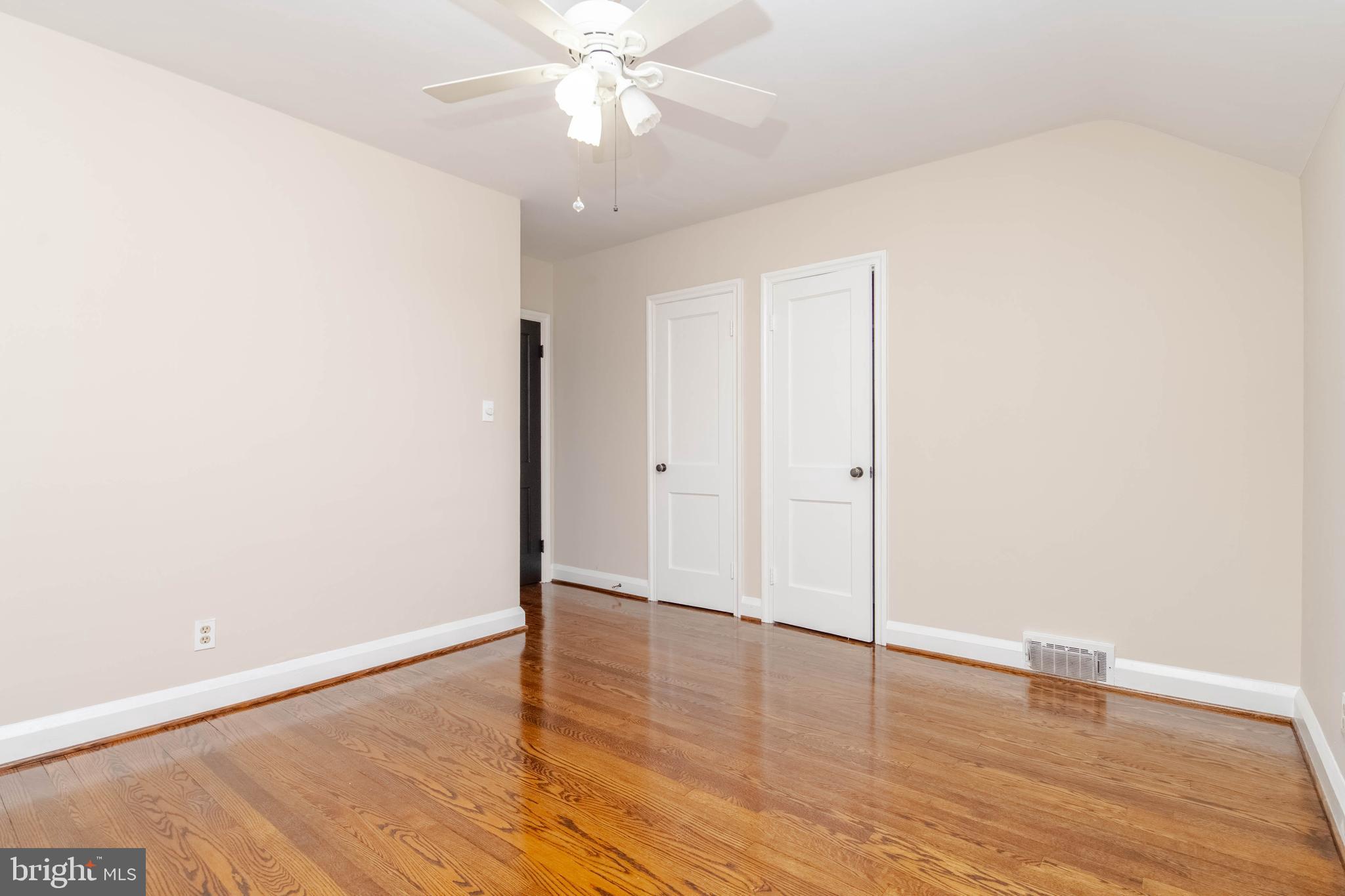 3004 Dunmurry Road Dundalk, MD 21222 - Photo 21 of 40 a view of an empty room with wooden floor