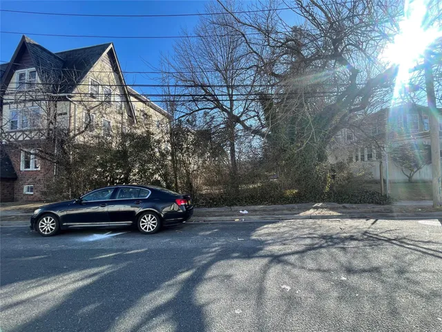 a car parked in front of a house