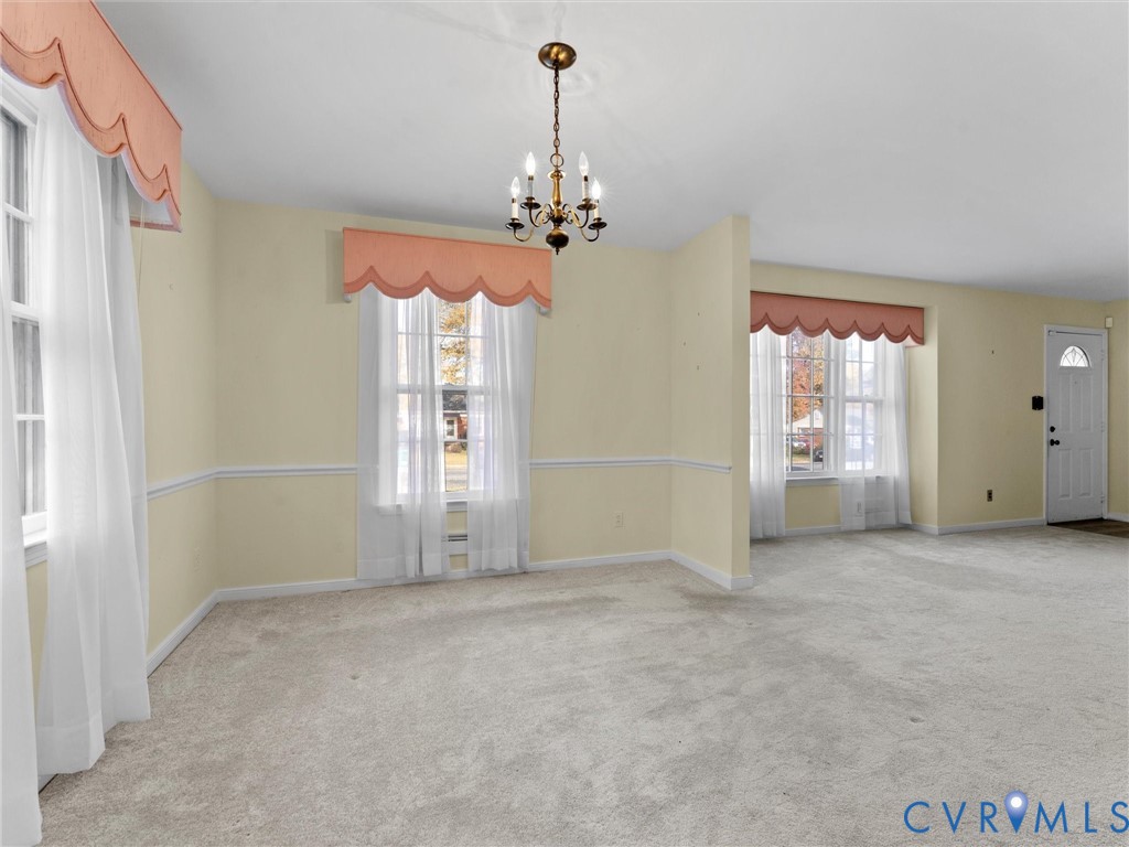1803 Windsordale Drive Henrico, VA 23229 - Photo 12 of 46 Unfurnished dining area featuring light colored ca