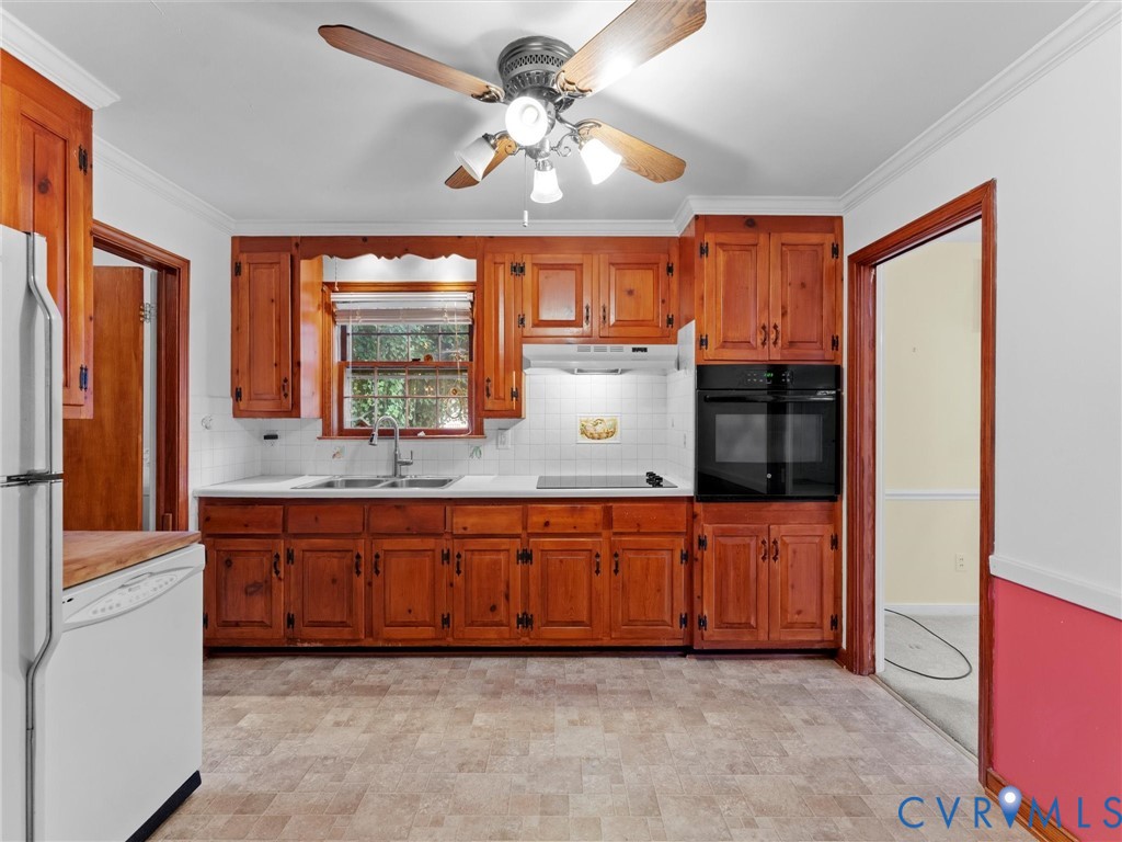 1803 Windsordale Drive Henrico, VA 23229 - Photo 15 of 46 Kitchen featuring light countertops, black applian