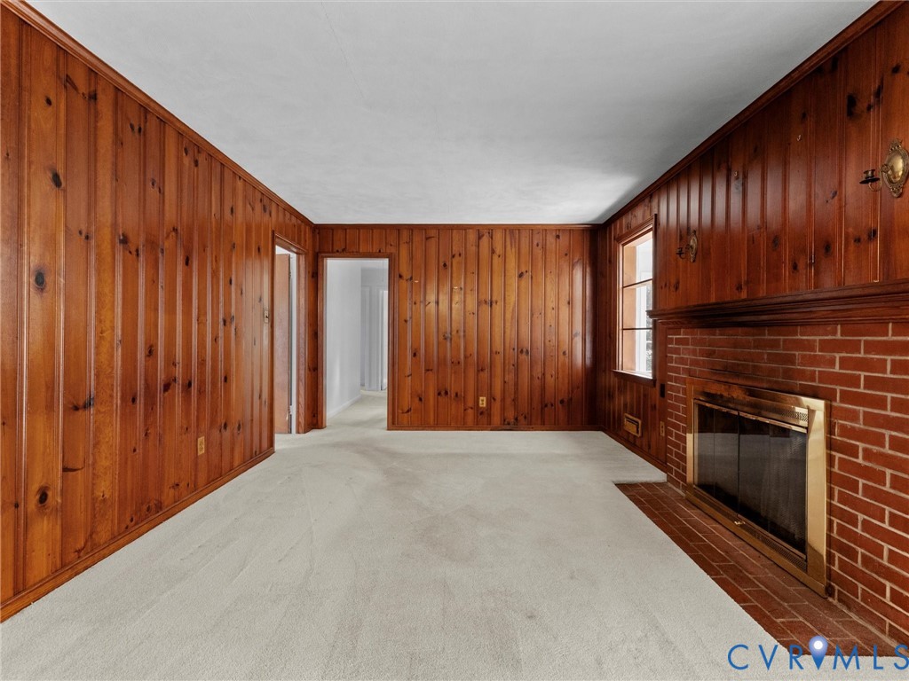 1803 Windsordale Drive Henrico, VA 23229 - Photo 21 of 46 Unfurnished living room featuring wooden walls, ca