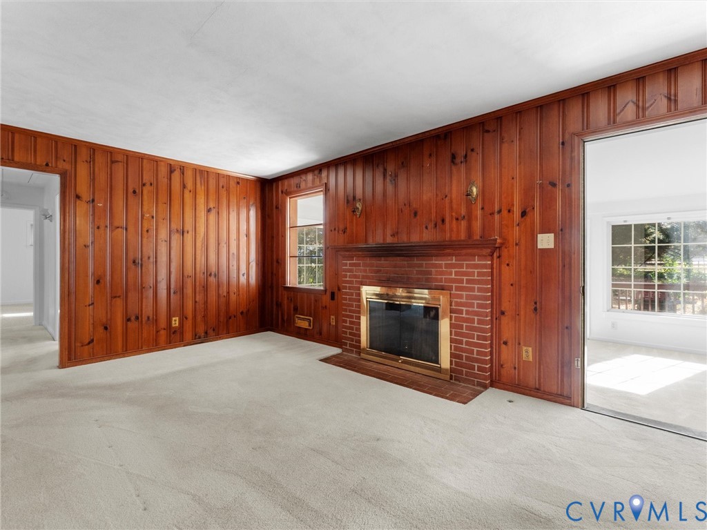 1803 Windsordale Drive Henrico, VA 23229 - Photo 22 of 46 Unfurnished living room featuring wooden walls, ca