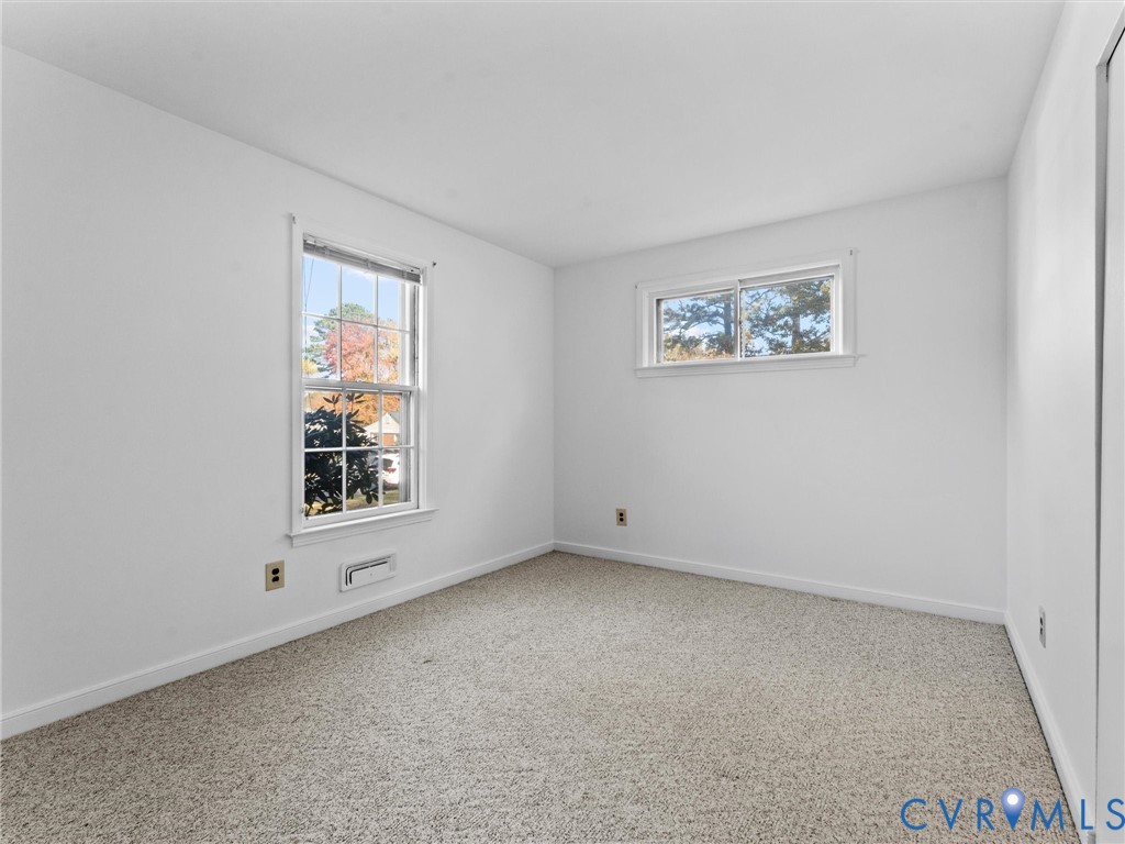 1803 Windsordale Drive Henrico, VA 23229 - Photo 31 of 46 Empty room featuring healthy amount of natural lig