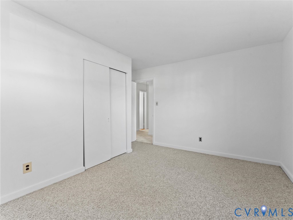 1803 Windsordale Drive Henrico, VA 23229 - Photo 32 of 46 Unfurnished bedroom featuring carpet and a closet