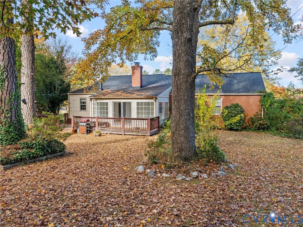 1803 Windsordale Drive Henrico, VA 23229 - Photo 5 of 46 Rear view of house featuring a chimney, a deck, an