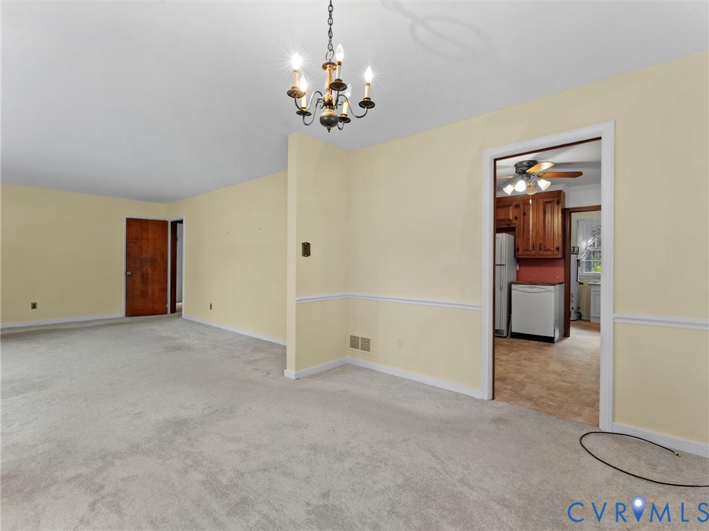 1803 Windsordale Drive Henrico, VA 23229 - Photo 10 of 46 Unfurnished room featuring light carpet, a chandel