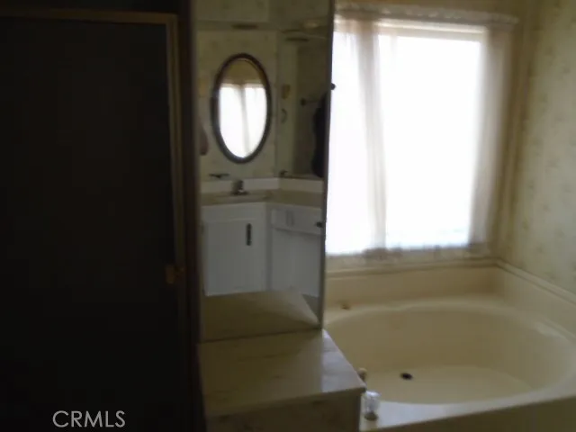 a view of empty room with windows