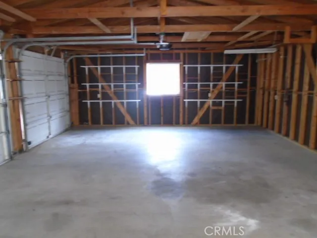 a view of a backyard of the house