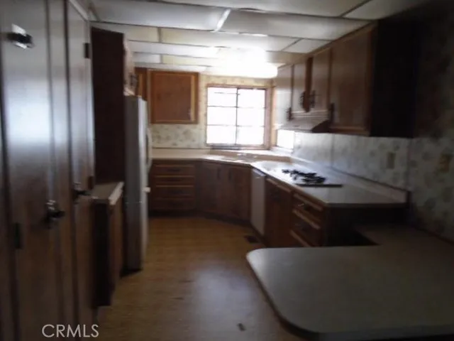 view of hall way with furniture