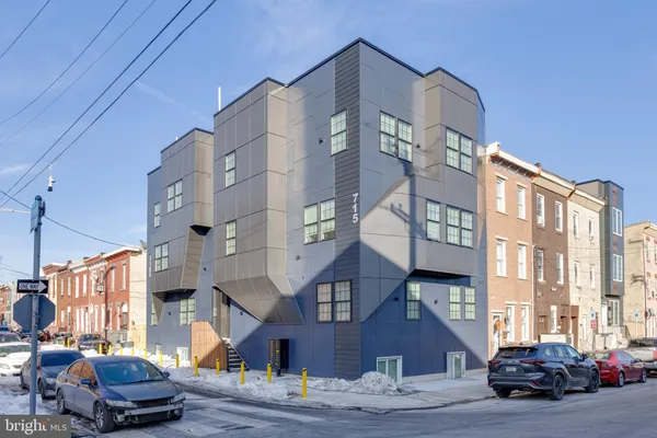 a front view of a building with street view