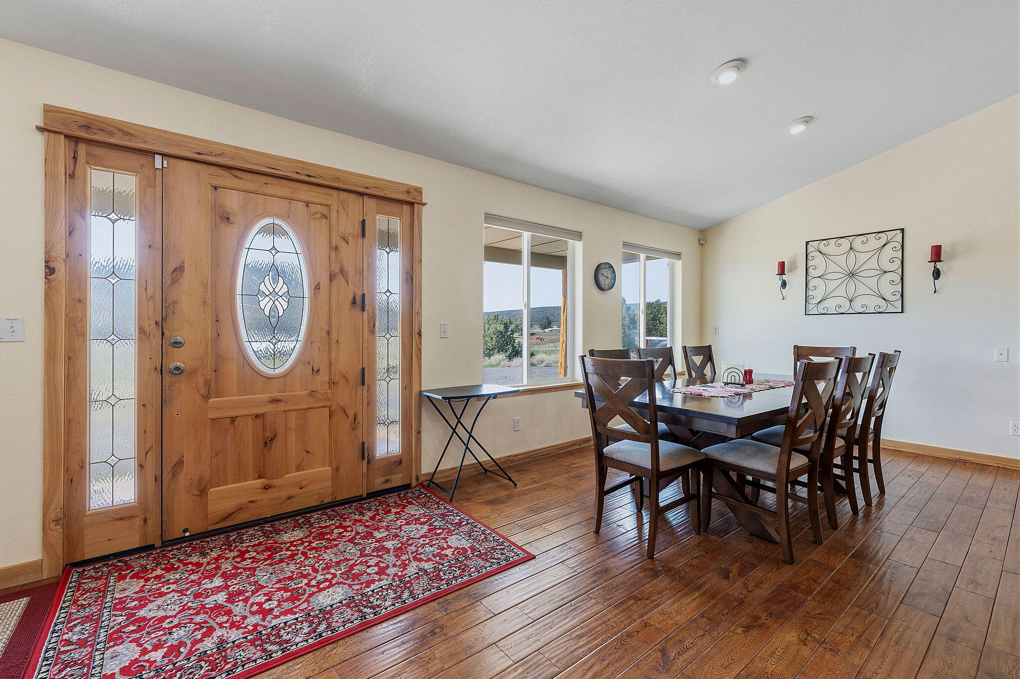 41221 Van Lake Road Prineville, OR 97754 - Photo 16 of 189 a view of a dining room with furniture window and wooden floor