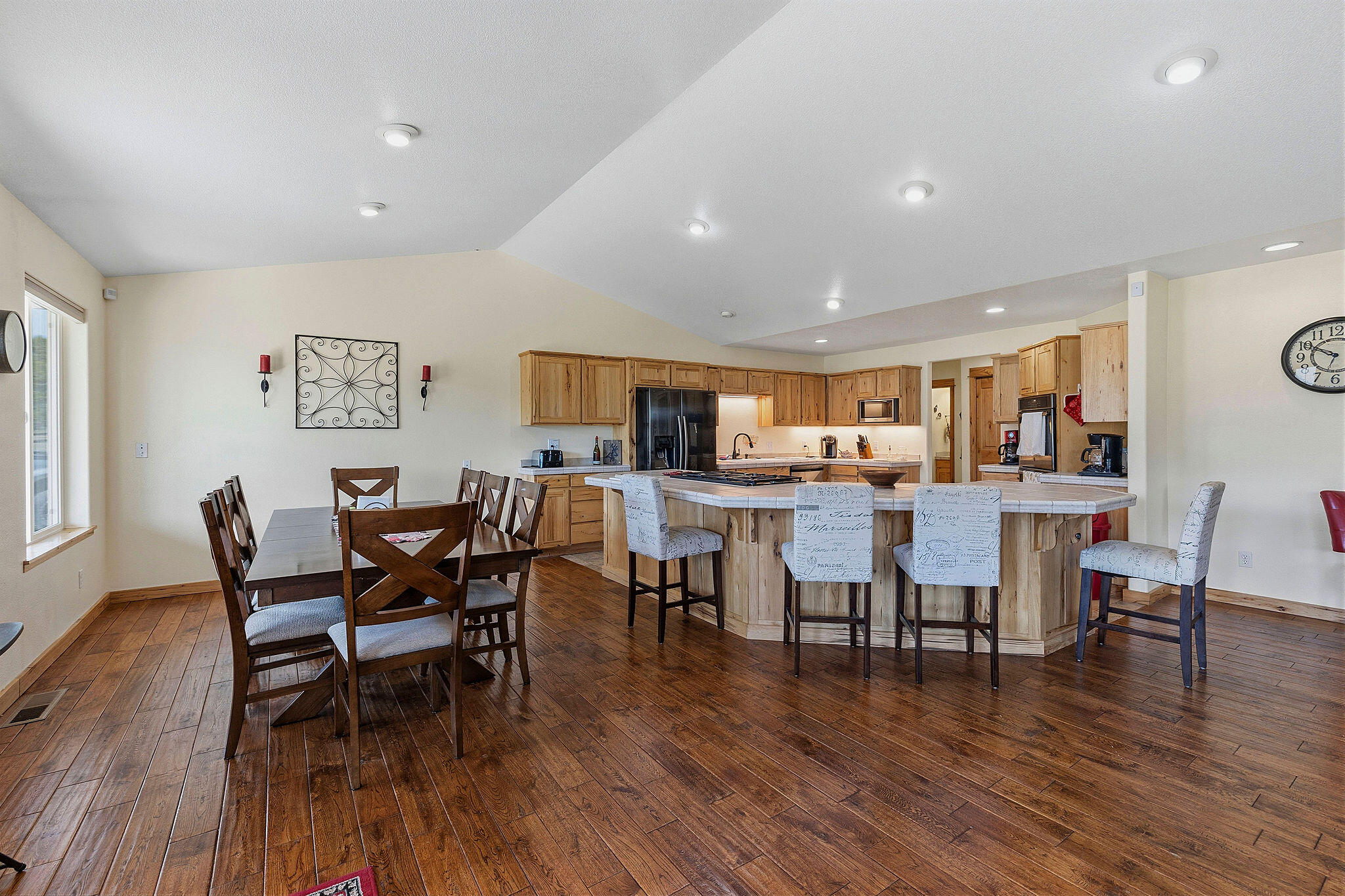 41221 Van Lake Road Prineville, OR 97754 - Photo 8 of 189 a view of a dining room with furniture wooden floor and a window